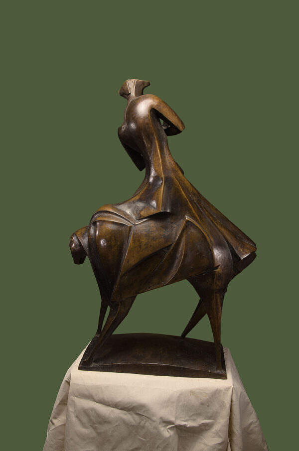 Shaman bronze sculpture semir rear side on green background